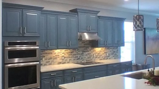 Kitchen cabinets refinished in blue-gray by K&C Cabinet Refinishing & Painting